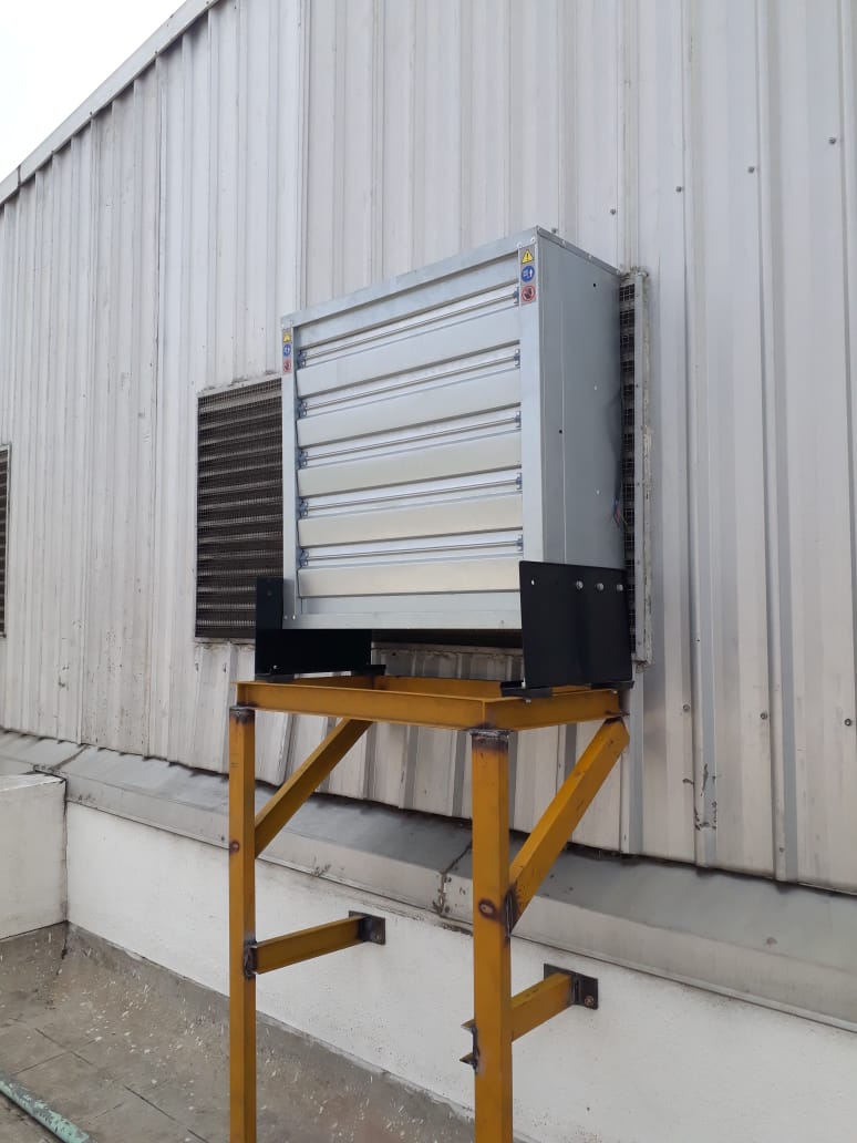 Crystal Ventilations installation team commissioning a fan